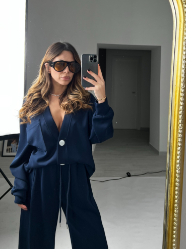 Tuta lumina blu